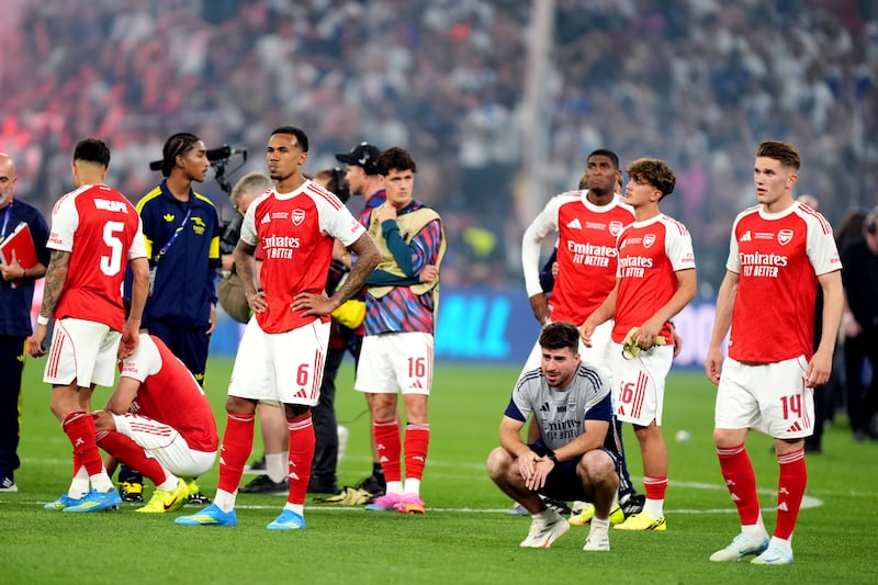 Arsenal players dejected after Saturday's defeat to PSG. Photograph: Mike Egerton/PA