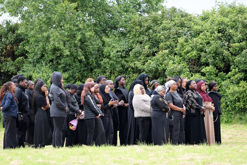 Family and friends gather for the funeral of Qayyum Balogun, at Newtown Cross Lawn Cemetery, Drogheda, Co Louth. Photograph: Dara Mac Dónaill / The Irish Times