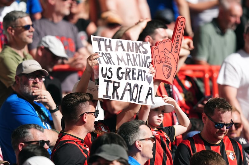 A Bournemouth fans holds a sign directed at departing manager Andoni Iraola during their Premier League game away to Nottingham Forest in May. Photograph: Mike Egerton/PA