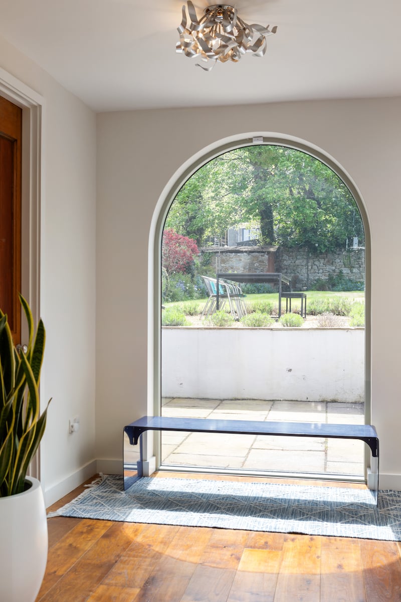 Arched window off dining area