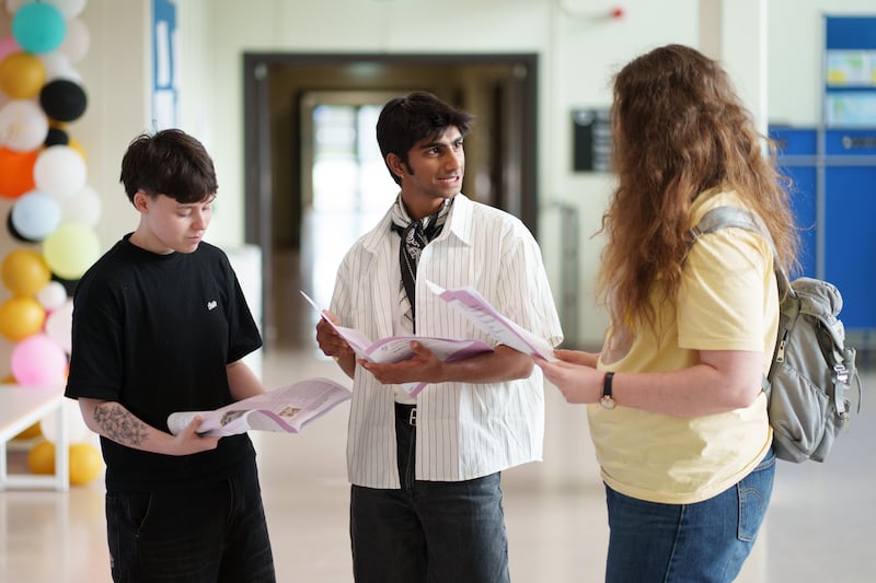 Mya Doyle, Juzé Pereira and Polina Beliakoff discuss how their Leaving Cert English paper two went at Belmayne Educate Together Secondary School.  Photograph: Fran Veale