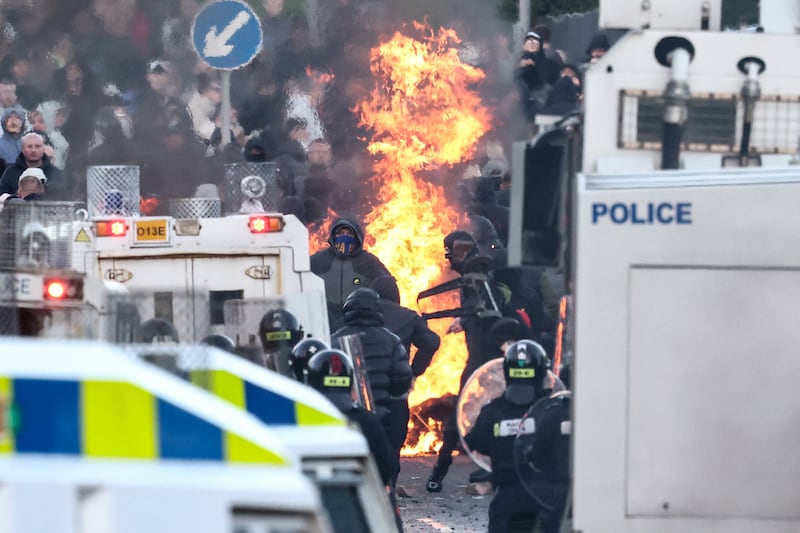 Protesters block a road leading to a hotel previously believed to house migrants in Glengormley, north of Belfast, on Wednesday. Photograph: Henry Nicholls/AFP via Getty Images