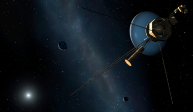 A spacecraft no larger than a small car, launched the year Star Wars came out, is still moving outward at 38,000 miles per hour far beyond the orbit of Pluto — and the radio signals it sends home, traveling at the speed of light, now take more than 23 hours to reach the engineers who built it, most of whom are no longer alive
