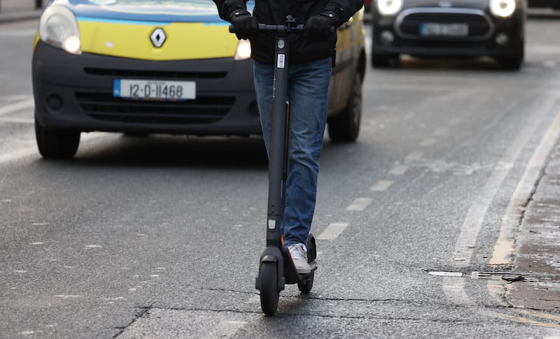 An e-scooter in Dublin traffic. 'The thing about traumatic brain injuries is that once they’ve happened, you can’t undo them.' Photograph: Bryan O’Brien
