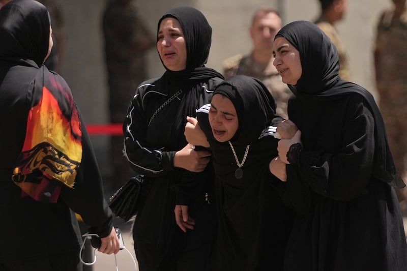 Relatives of Lebanese soldier Hussein Nazzal, who was killed on Saturday in south Lebanon, mourn during his funeral procession. Photograph: Hassan Ammar/AP