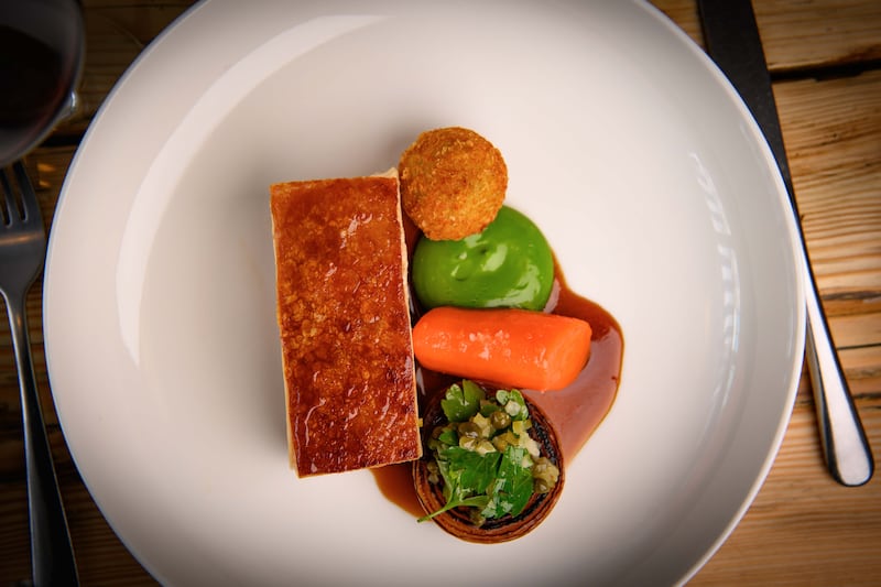 Confit pork belly, crispy pork cheek, glazed Carrot, onion and parsley, and jus. Photograph: Daragh Mc Sweeney/Provision