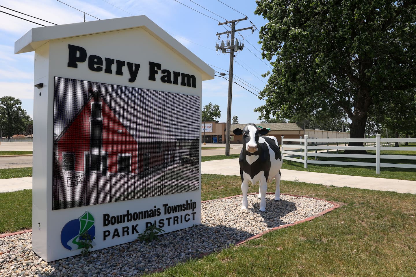 Perry Farm Park's cow statue now greets parkgoers at the park's entrance on the corner of Kennedy Drive and Perry Street.