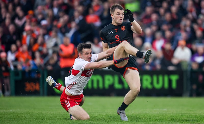 Armagh's Peter McGrane and Shea Downey of Derry. Photograph: Nick Elliott/Inpho