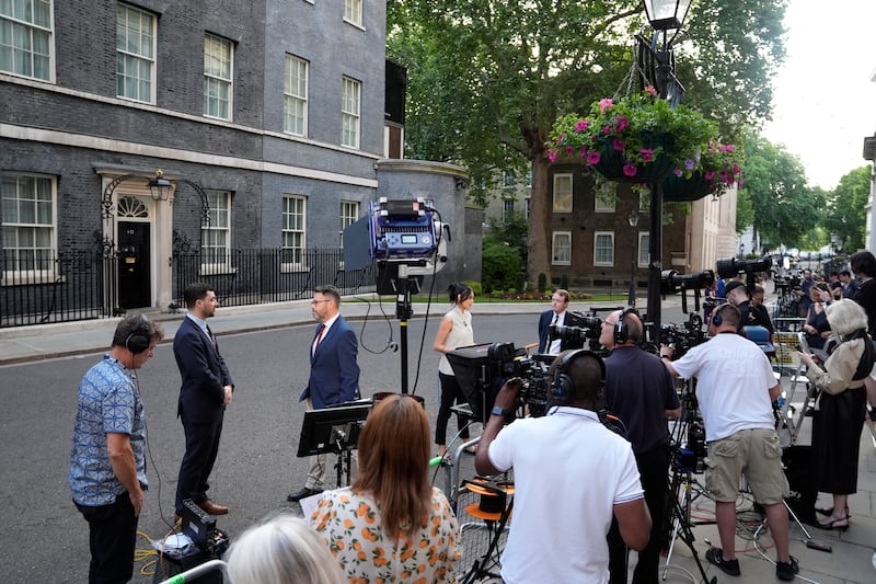 Members of the media outside Number 10 Downing Street. Photograph: Andrew Matthews/PA Wire