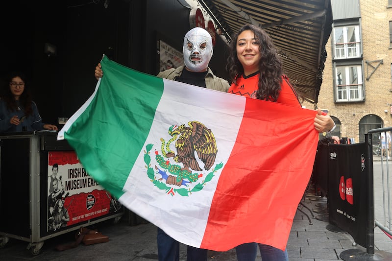 Oscar Castillo and his friend Laura González outside the Button Factory in Dublin before the start of the World Cup