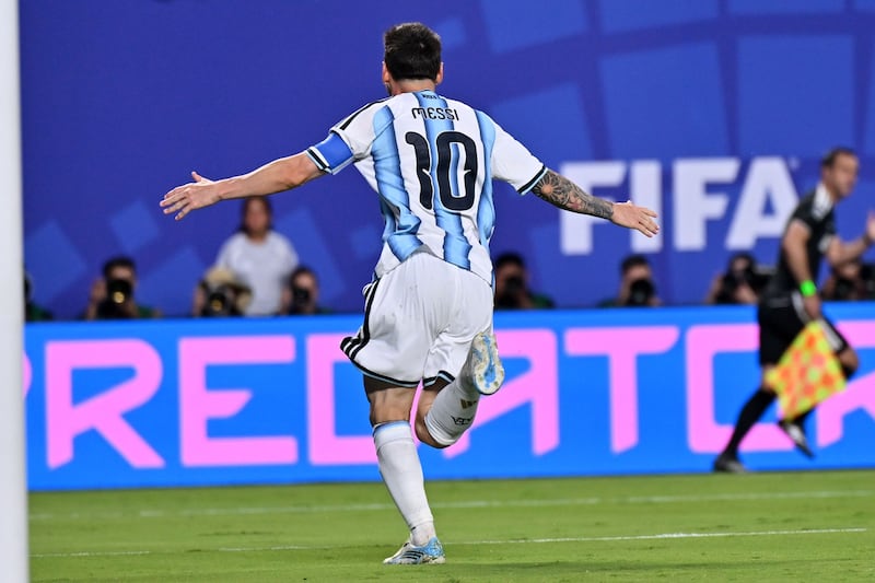 Lionel Messi of Argentina celebrates scoring the second goal against Algeria in Kansas City, Photograph: EPA