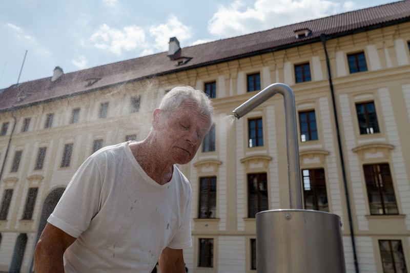 A man cools off at a mist station during earlier this week. Photograph: Fadi Yousef/EPA