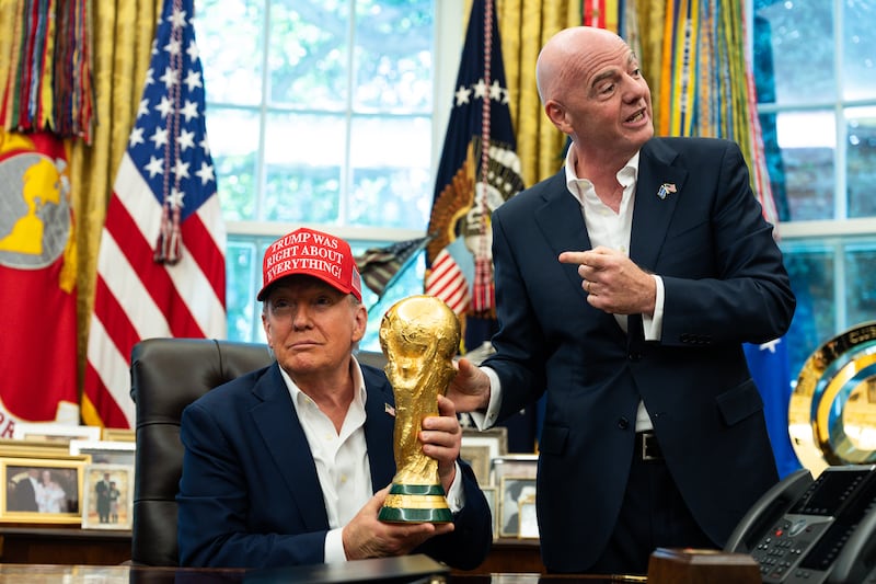 President Donald Trump with Fifa president Gianni Infantino - and the World Cup - in the White House last year. Photograph: Tierney L Cross/The New York Times
                      