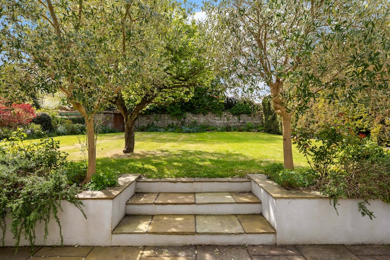 Patio steps leading to rear garden