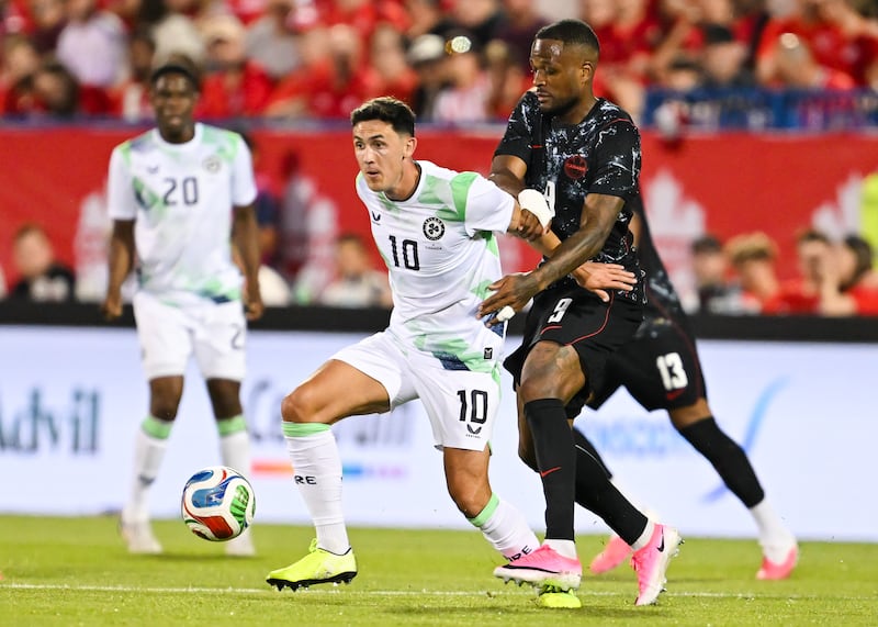 Jamie McGrath of the Republic of Ireland controls the ball against Cyle Larin of Canada in the second half. Photograph: Minas Panagiotakis/Getty Images