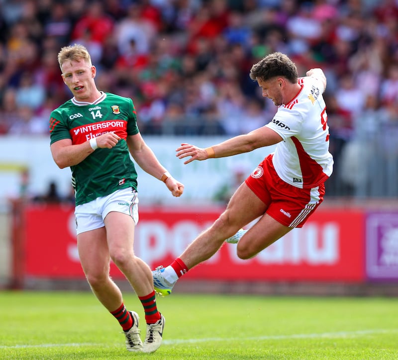 Mayo's Ryan O'Donoghue and Tyrone's Michael McKernan. Photograph: Tom O’Hanlon/Inpho