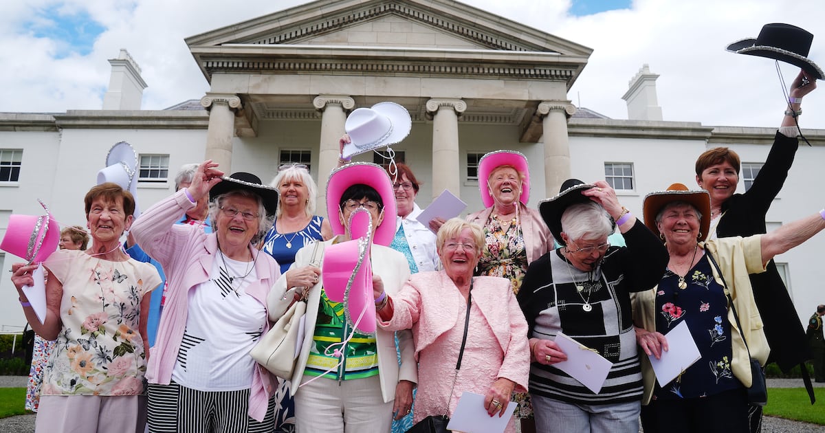 ‘Any prosecco in there?’ Blue skies and big hats at Catherine Connolly’s first Áras garden party – The Irish Times