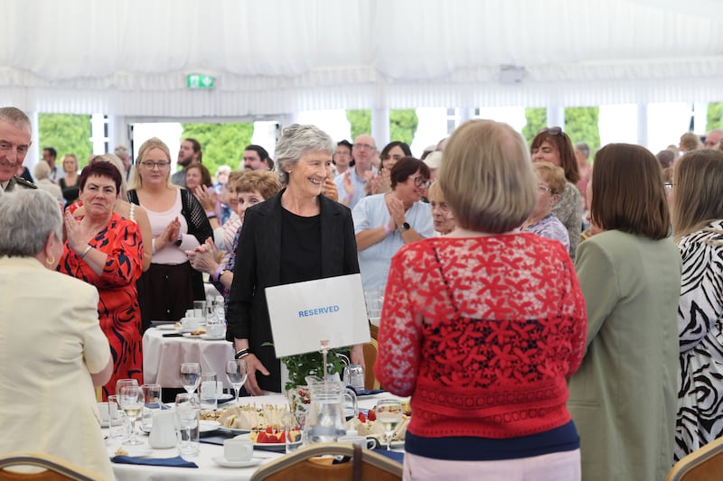 Catherine Connolly greets guests at the first garden party of her presidency at Áras an Uachtaráin. Photograph: Dara Mac Dónaill/The Irish Times
