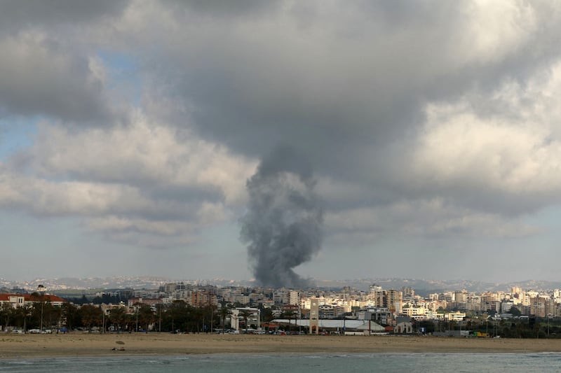 Smoke rises from the site of an Israeli air strike that targeted a neighbourhood in the southern Lebanese coastal city of Tyre on Sunday. Photograph: Kawnat Haju/AFP/Getty 