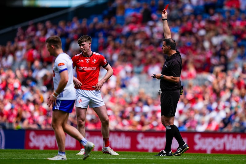 Seán Hurson referee gives a red card to Seán Callaghan of Louth. Photograph: James Lawlor/Inpho