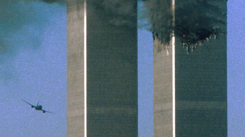 Hijacked United Airlines flight 175 flies towards the World Trade Center twin towers shortly before hitting the south tower on September 11th, 2001. Photograph: Sean Adair/Reuters