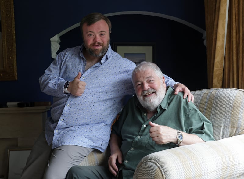 Ivan Martin and his son James speaks to The Irish News.
PICTURES: COLM LENAGHAN