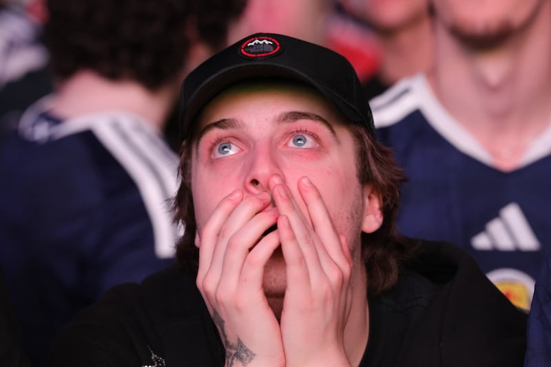A Scotland fan watching the World Cup game against Haiti at OVO Hydro in Glasgow. Photograph: Steve Welsh/PA Wire