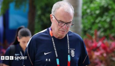Close-up of Marcelo Bielsa in a Uruguay training shirt, looking downwards