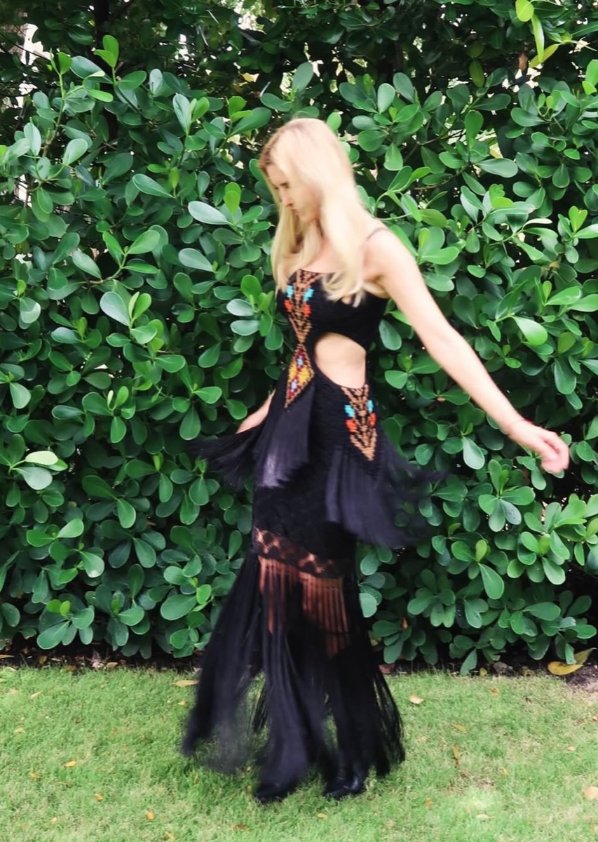 Ivanka Trump turned heads in a boho-chic ensemble complete with ultra-thin straps, intricate embellishments, and flowing fringe accents.