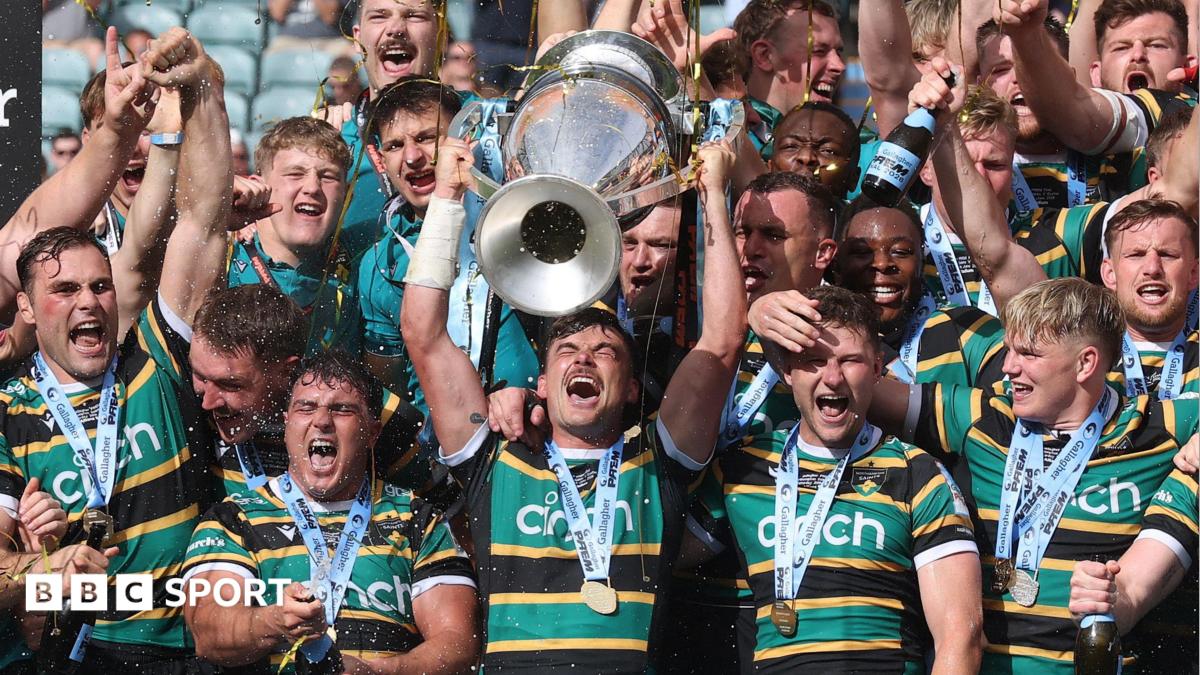 Fraser Dingwall and Fin Smith lift the Prem Rugby trophy following Northampton's win over Exeter