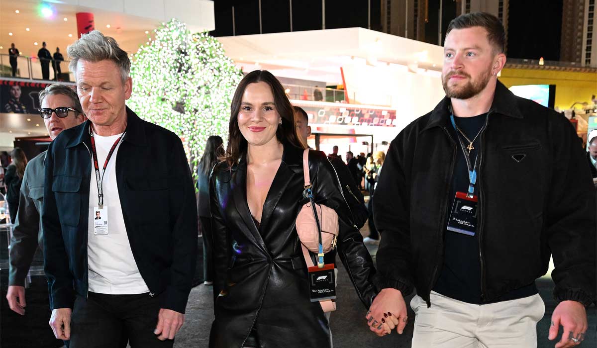LAS VEGAS, NEVADA - NOVEMBER 23: Gordon Ramsay, Holly Anna Ramsay and Adam Peaty walk in the Paddock prior to the F1 Grand Prix of Las Vegas at Las Vegas Strip Circuit on November 23, 2024 in Las Vegas, Nevada. (Photo by Mark Sutton - Formula 1/Formula 1 via Getty Images)
