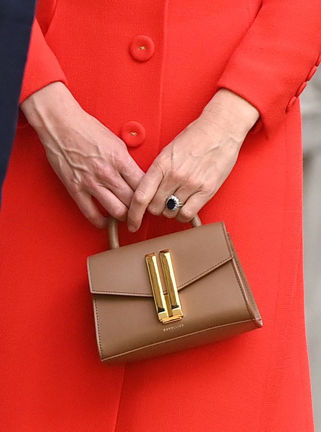 Kate Middleton added a sophisticated touch to her outfit with DeMellier's Nano Montreal bag.