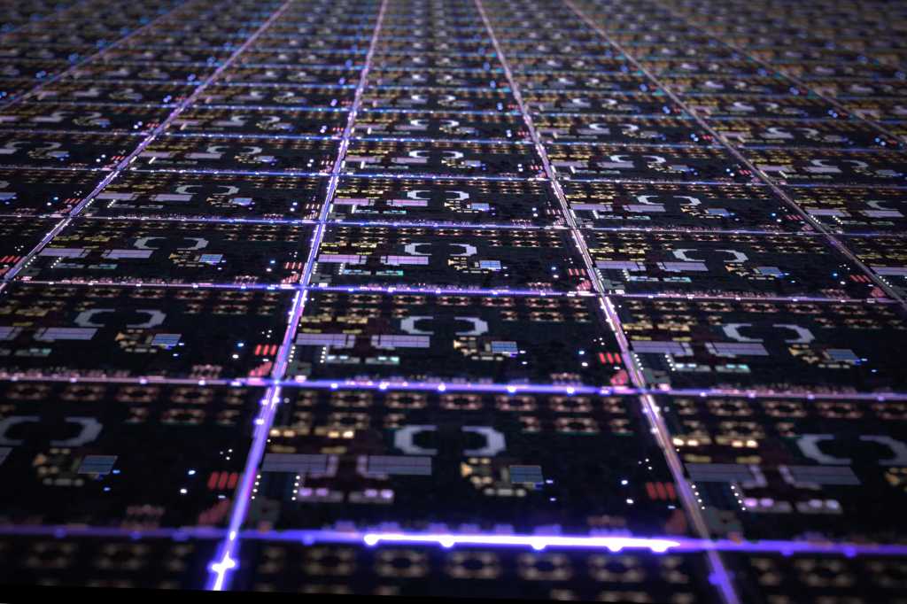 Apple showing hundreds of apple silicon chips on a wafer