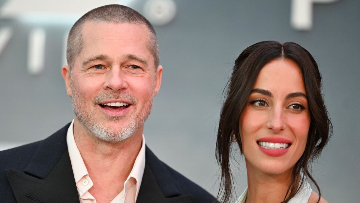 Brad Pitt and Ines de Ramon hold hands on Paris date night in the most stylish color-blocked looks