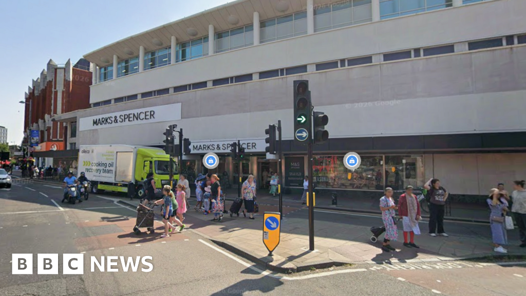Man arrested on suspicion of attempted murder after car hits shoppers - BBC