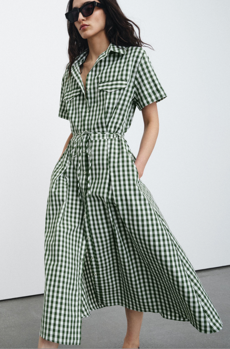 green and white checkered dress with a buttonup design and waist tie green and white checkered dress with a buttonup design and waist tie