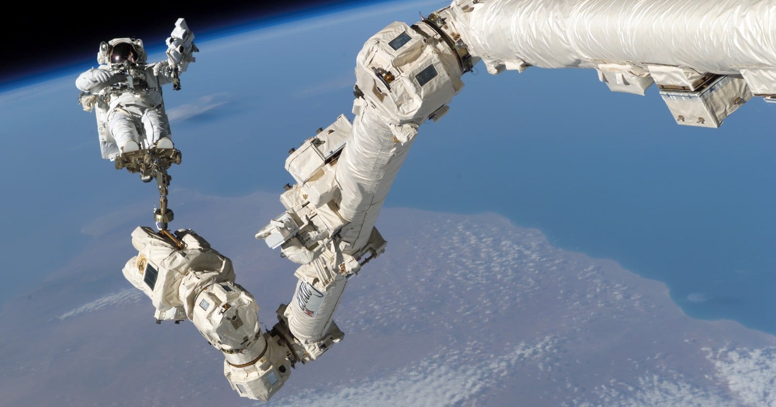 NASA astronauts head outside the space station to replace a Canadarm2 wrist joint that malfunctioned after 25 years in orbit