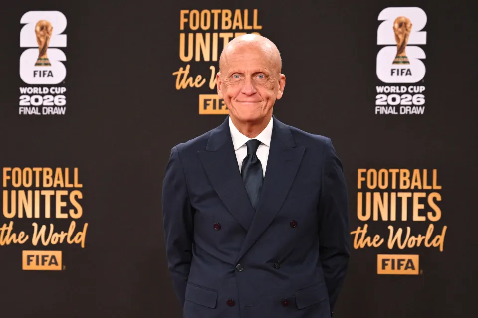 Chairman of the FIFA Referees Committee Pierluigi Collina poses on the red carpet upon arrival to attend the draw for the 2026 FIFA Football World Cup