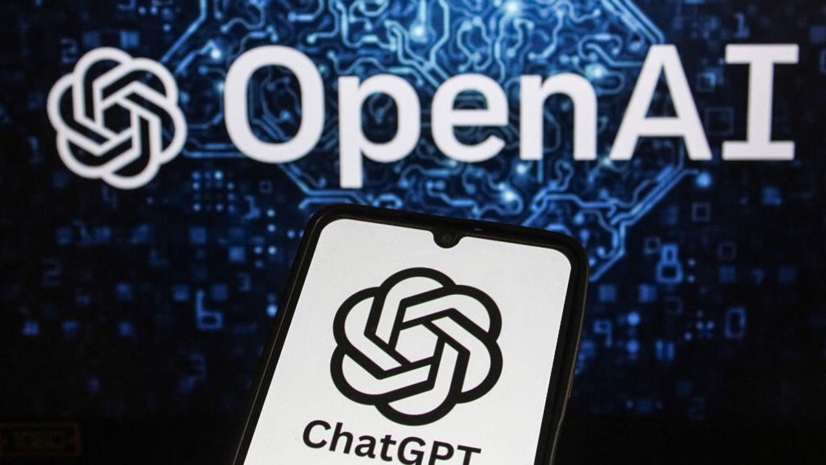 ChatGPT logo on smartphone in front of OpenAI screen