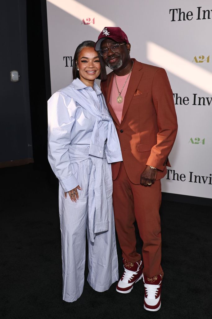 Dannella Howery and Lil Rel Howery attends the Los Angeles premiere of A24's "The Invite" at DGA Theatre on June 24, 2026 in Los Angeles, California. 