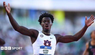 Ja'Kobe Tharp celebrates after breaking the 110m hurdles world record at the NCAA championships in June 2026