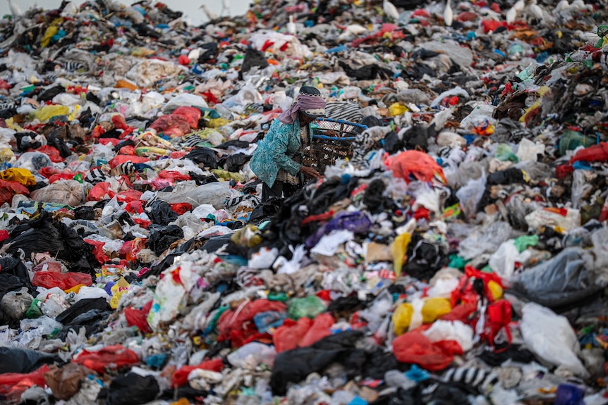 A close up of an expanding pile of trash in Bali.