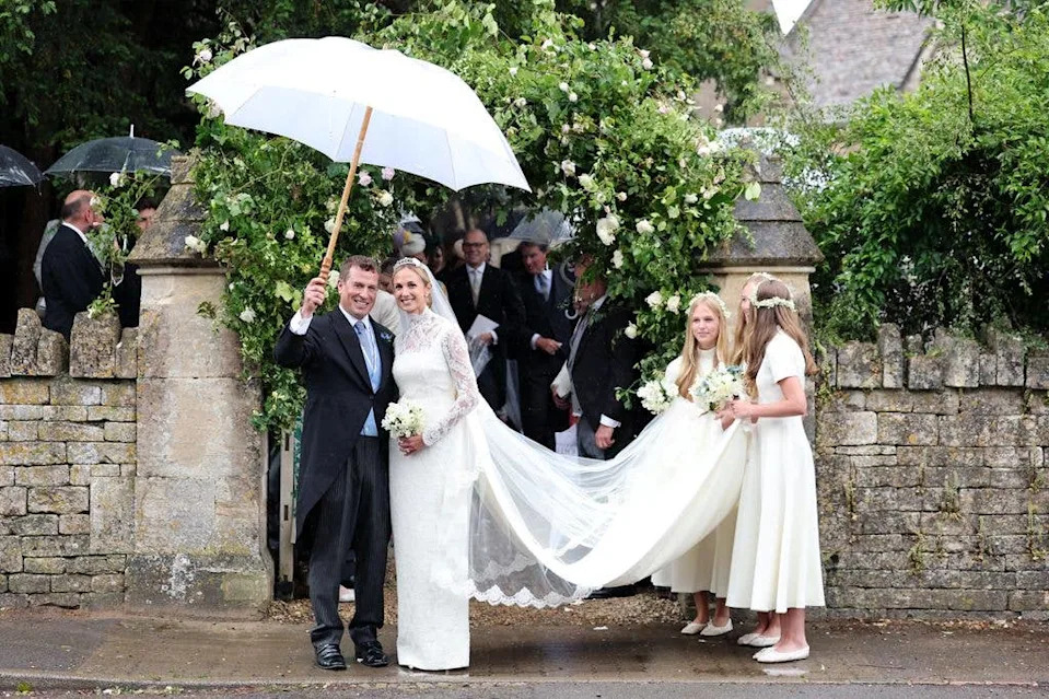 Peter Phillips and Harriet Sperling depart from their Royal wedding alongside bridesmaids Georgina Sperling, Savannah Phillips and Isla Phillips at All Saints' Church