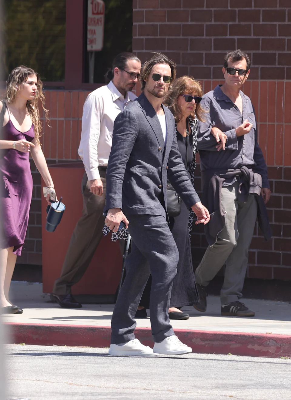 Berry’s ex Gabriel Aubry was also at the ceremony, wearing a grey suit, white sneakers and sunglasses, and walking solo (as pictured here). Dsanchez/CPR / BACKGRID