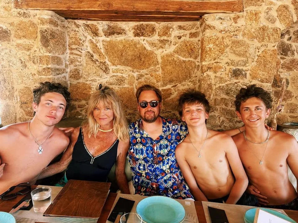 Goldie Hawn posed in a studded swimsuit as she enjoyed a meal out in Greece with her family 