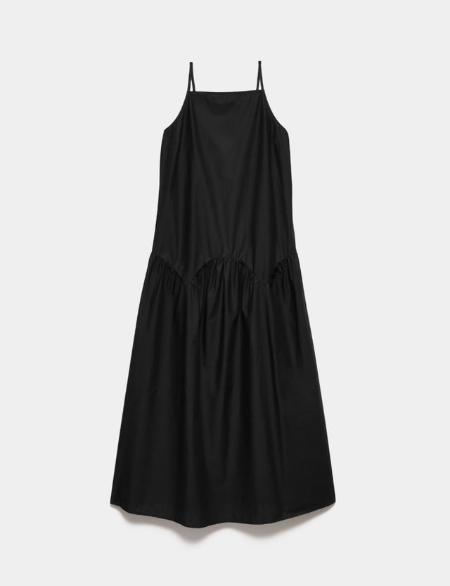 A black sleeveless dress with a gathered waistline a black sleeveless dress with a gathered waistline