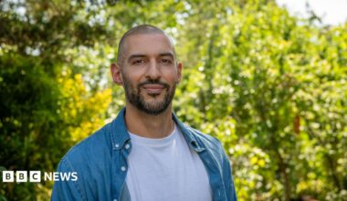 Marios, standing in front of trees