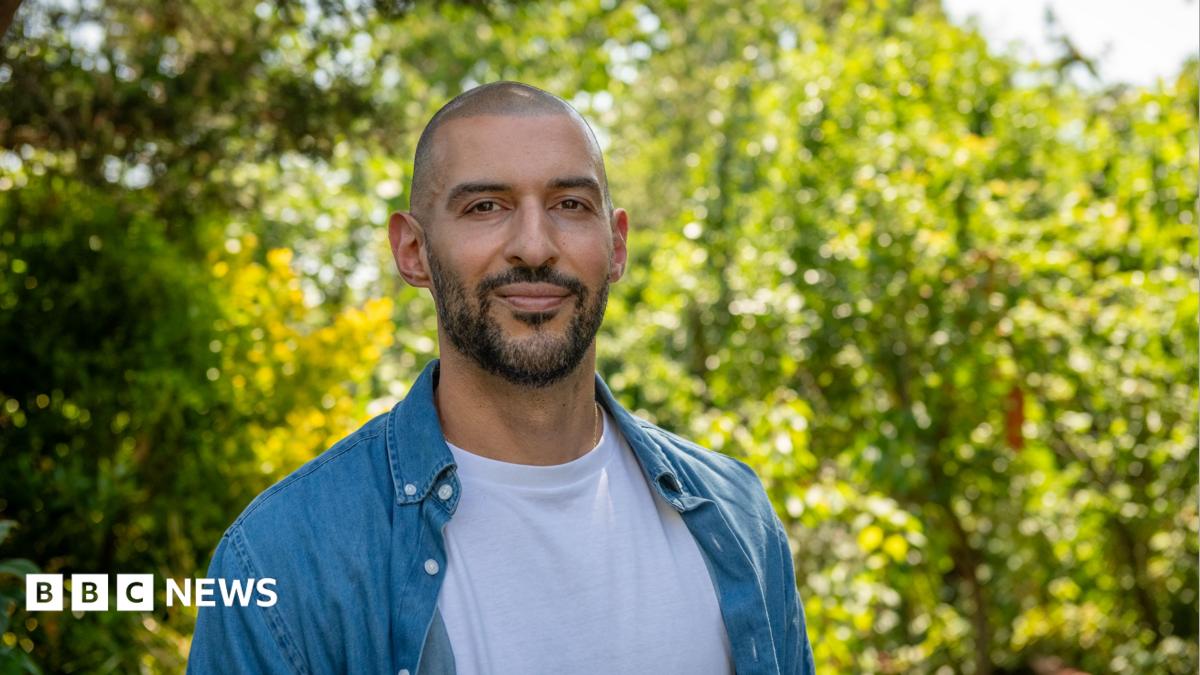 Marios, standing in front of trees