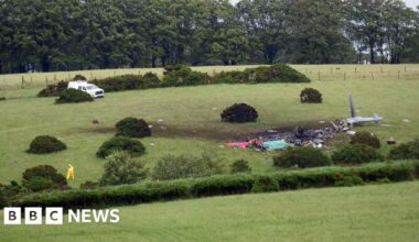 Royal Navy helicopter crash investigations continue in Devon - BBC