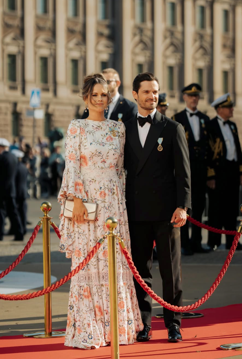 Princess Sofia stunned in a romantic floral gown while Prince Carl Philip looked sharp in a classic black tuxedo as they attended the royal gala honoring Sweden's king and queen.